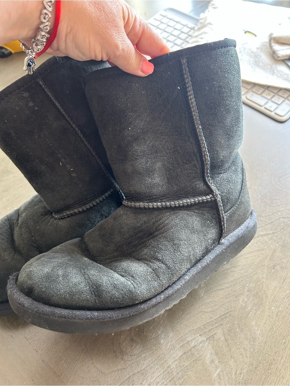 Well loved UGG Black Suede Shearling Boots - Picture 2 of 10